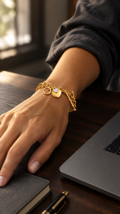 Pavé Hearts Bracelet worn at a desk