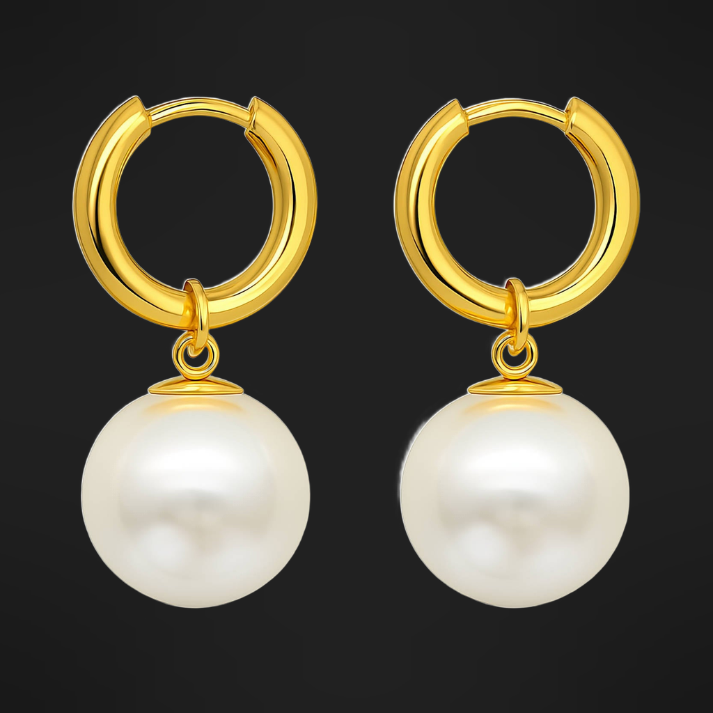 Pearl Drop Hoops in PVD gold over 316L stainless steel with a round pearl drop, on a black ground