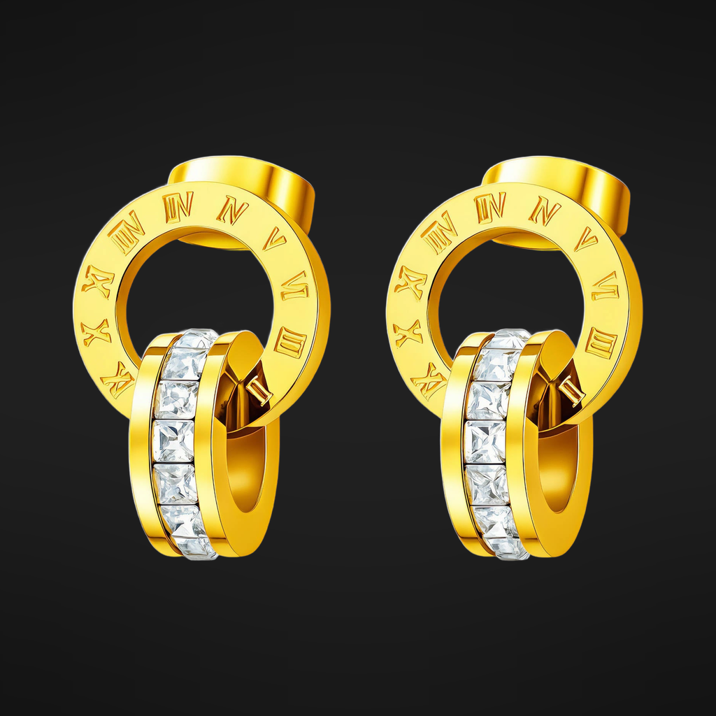 Roman Numeral Earrings in PVD gold over 316L stainless steel, a numeral ring linked through a channel-set band, on a black ground