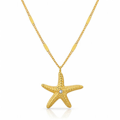 Starfish Pendant Necklace in gold, textured starfish with a single stone on a fine chain