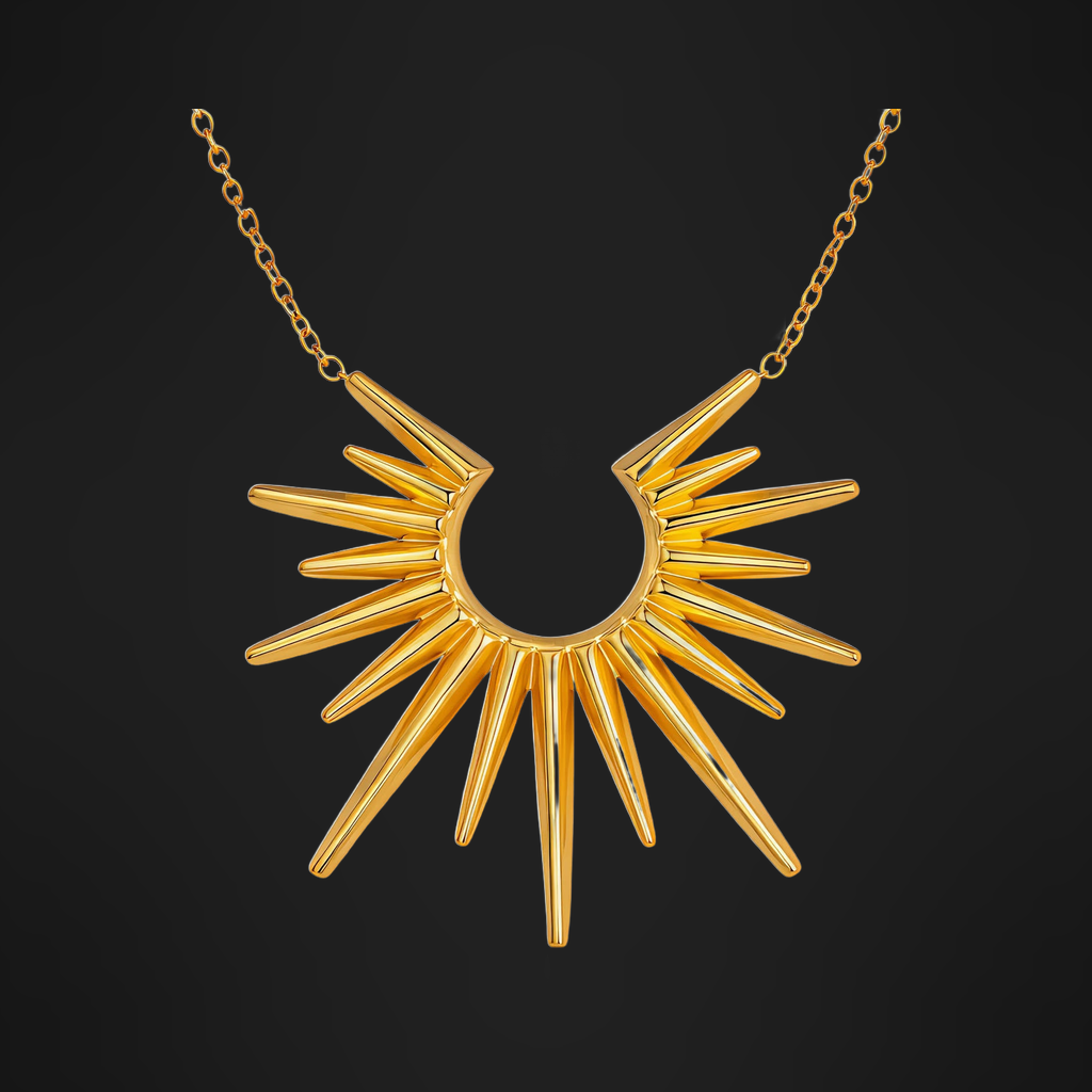 Statement Pendant Necklace in PVD gold over 316L stainless steel, a sunburst of tapered spikes on a fine chain, on a black ground