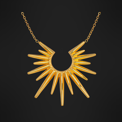 Statement Pendant Necklace in PVD gold over 316L stainless steel, a sunburst of tapered spikes on a fine chain, on a black ground